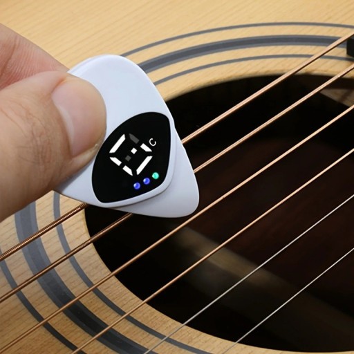 Afinador y calibrador de tono portátil para guitarra 2 en 1, accesorio musical multiusos, compacto, color blanco.