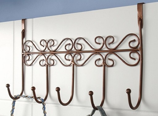 Appendiabiti in metallo con ornamento