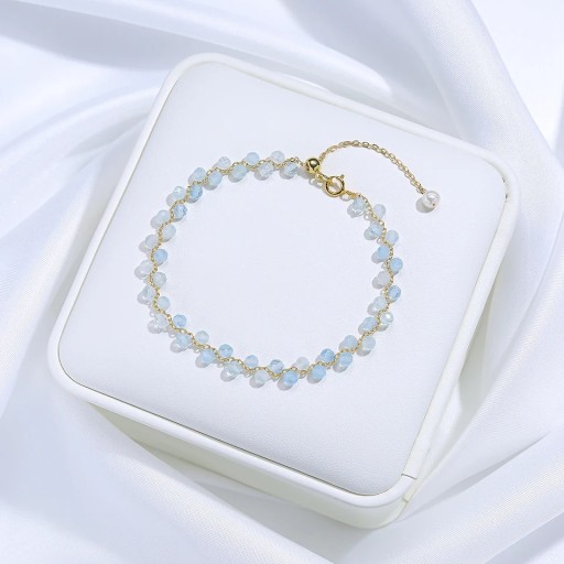 Armband mit Aquamarin Damen facettierte hellblaue Perlen Kette goldfarbig 16 - 20 x 3 mm Stein mit dekorativer Perle verstellbar