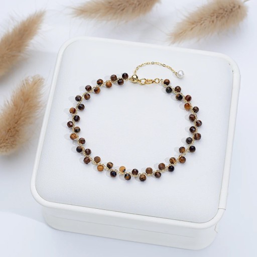 Armband mit Tigerauge Damen geschliffene braune Perlen Kette goldfarbig 16 - 20 x 3 mm Stein mit dekorativer Perle verstellbar