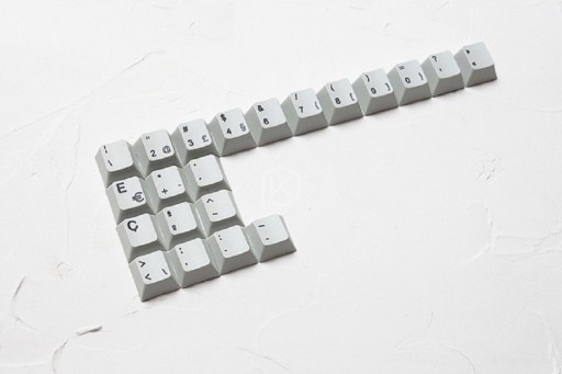 Austauschbare Tasten für eine internationale Tastatur