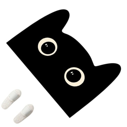 Badmat 40 x 60 cm in de vorm van een kattenkop met oren en grote ogen, met een antisliponderkant in zwart met crèmekleurige details