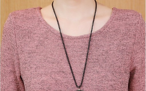 Blusa da donna con fiocco sulla schiena