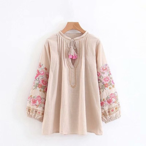 Blusa primaverile da donna con motivo floreale su maniche lunghe e ampie Scollo con cordoncino e frange Cuciture decorative Cotone e lino