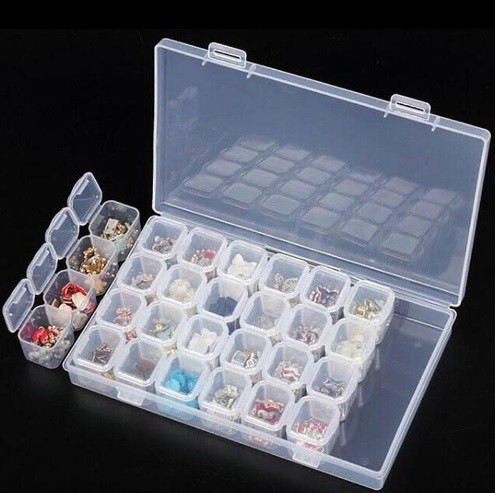Boîte à bijoux en plastique - transparente