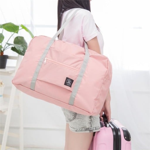 Bolsa de viaje plegable de poliéster con bolsillo frontal Para el mango de la maleta Desplegada 48 x 16 x 32 cm Plegada 21 x 18 cm
