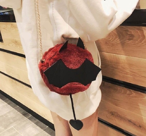 Bolso de mano de mujer con forma de diablo