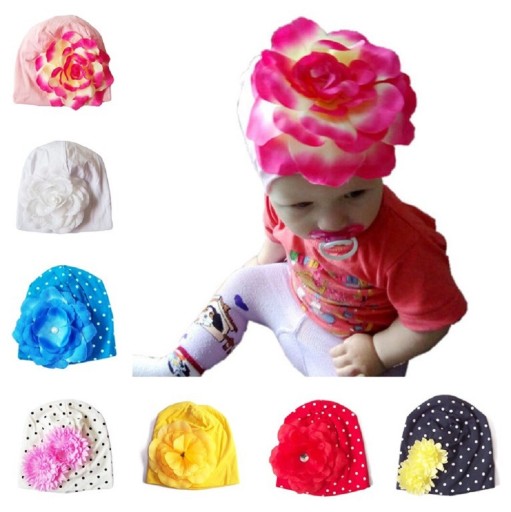 Bonnet fille avec fleur A496