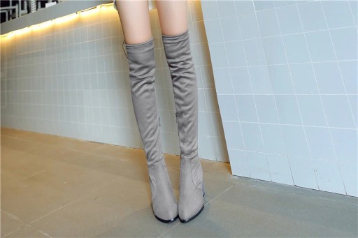 Botas elegantes acima do joelho