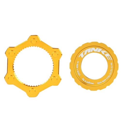 Bouchon Center Lock de disque de frein TANKE doré pour axes de 9/12/15 mm avec un couple de serrage de 40 Nm pour fixation sur le moyeu de roue