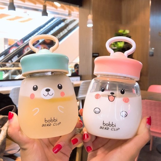 Bouteille de voyage pour enfants avec ours en peluche