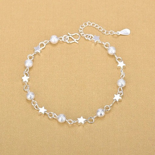 Bracciale da donna con perle e stelle