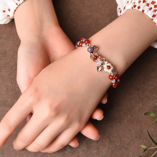 Bracelet à billes pour femmes avec des fleurs