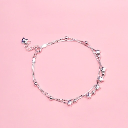 Bracelet double pour femme avec des étoiles