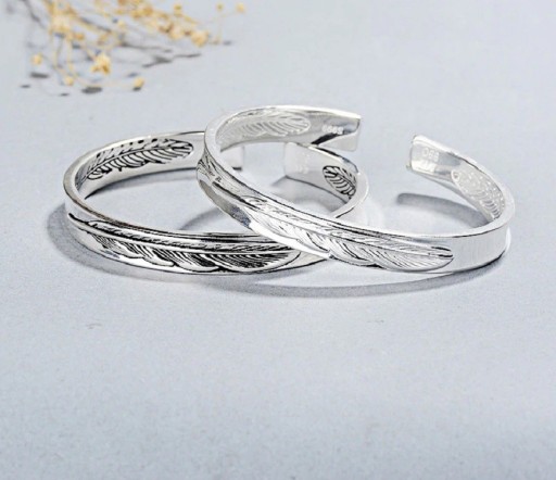 Bracelet ouvert en plume pour femme