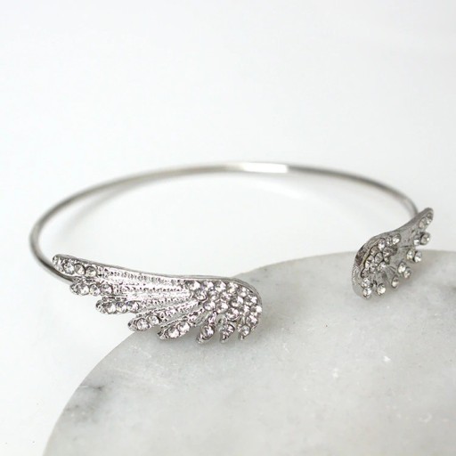 Bracelet ouvert pour femme avec des ailes