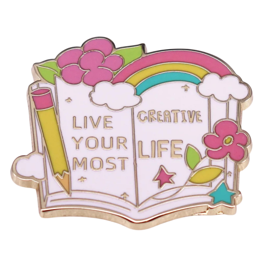 Broche open boek Live your most creative life metalen pin kleurrijke badge met een regenboog en bloemen voor kleding rugzak