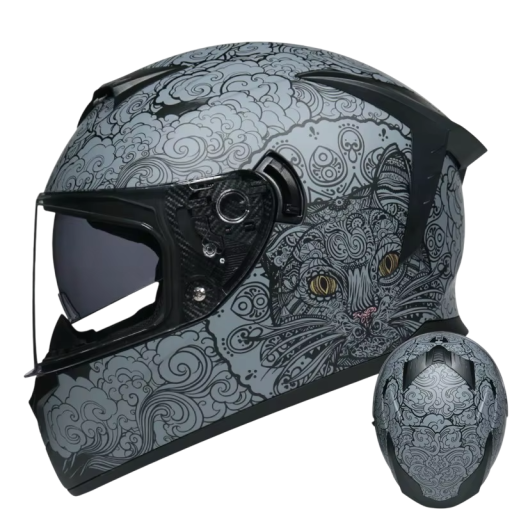 Casco de moto abatible, color gris, con original dibujo de gato. Casco de protección con ventilación. Acolchado extraíble. Equipamiento de motocicleta con estilo.