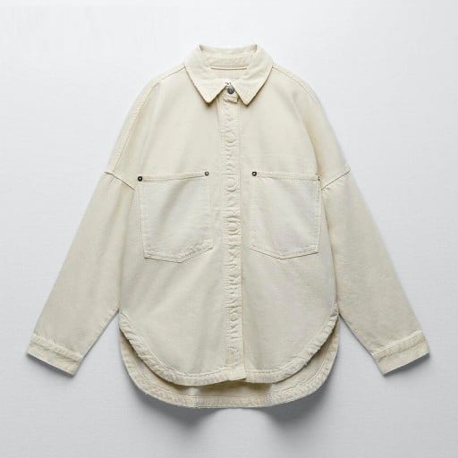 Chaqueta de camisa oversize para mujer de mezclilla de algodón Grandes bolsillos aplicados Cierre oculto Hombros caídos Bajo