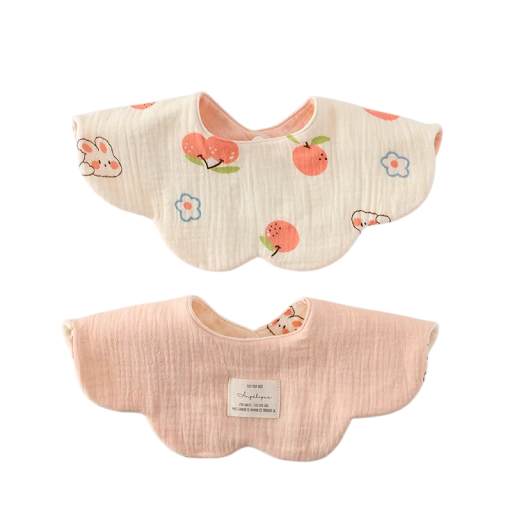 Children's Bib with Reversible Design Beige Side with Cherries and Bunnies Light Pink Smooth Side Wavy Edge Press Stud at Neck
