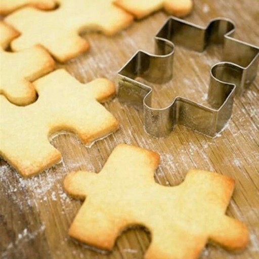 Cortador de galletas de acero inoxidable con forma de rompecabezas