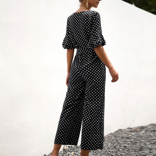 Dame jumpsuit med polkaprikker og flæser