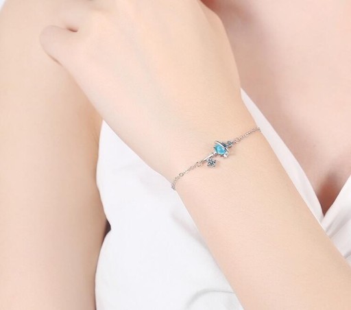 Damenarmband mit blauem Kristall