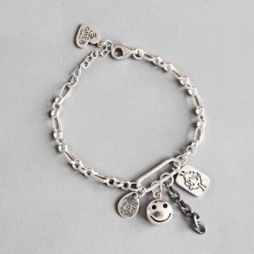 Damenarmband mit Charms P105