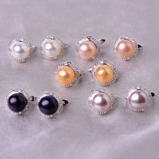 Dames oorbellen met parels en stenen