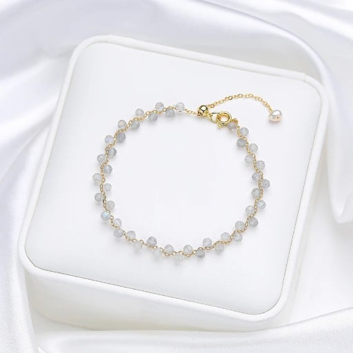 Damesarmband met labradoriet geslepen grijze kralen gouden ketting 16 - 20 x 3 mm steen met decoratieve parel verstelbaar