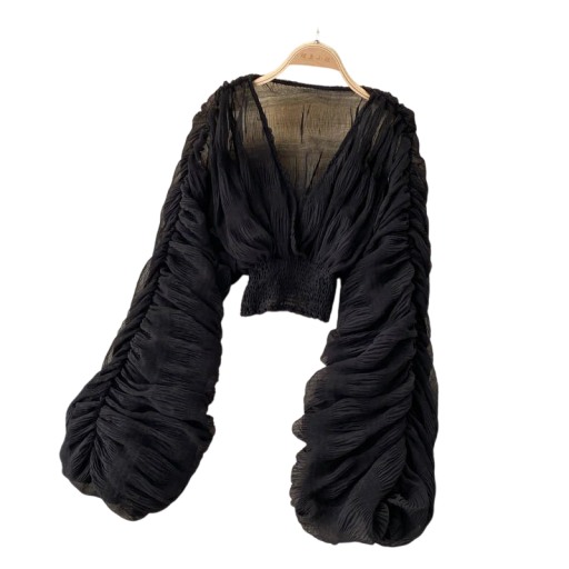 Damesblouse met diepe halslijn en pofmouwen. Top met ruches en elastische tailleband. Elegante blouse voor de zomer in de stad en op een feestje.