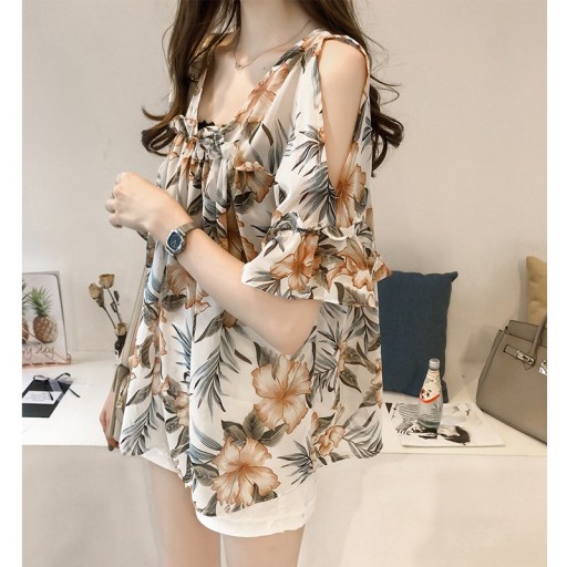 Damesblouse met uitsparingen