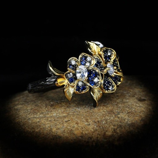 Damesring met bloemen D1574