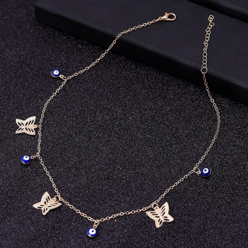 Damhalsband med pärlor och fjärilar