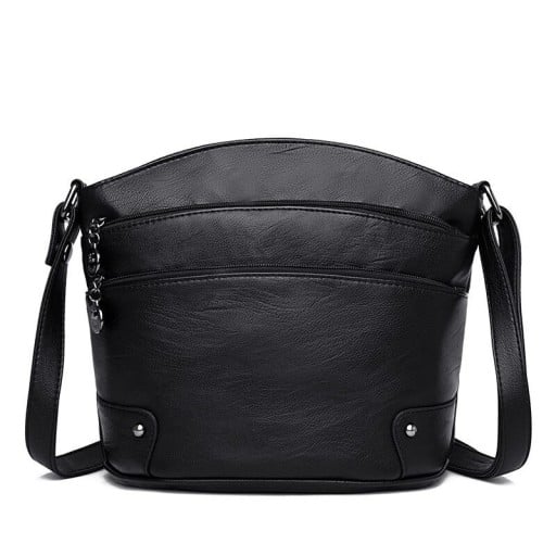 Dámska crossbody kabelka s niekoľkými vreckami na zips Oblý tvar Nastaviteľný popruh cez rameno Ozdobný kovový prívesok 24 x 22 x 11 cm