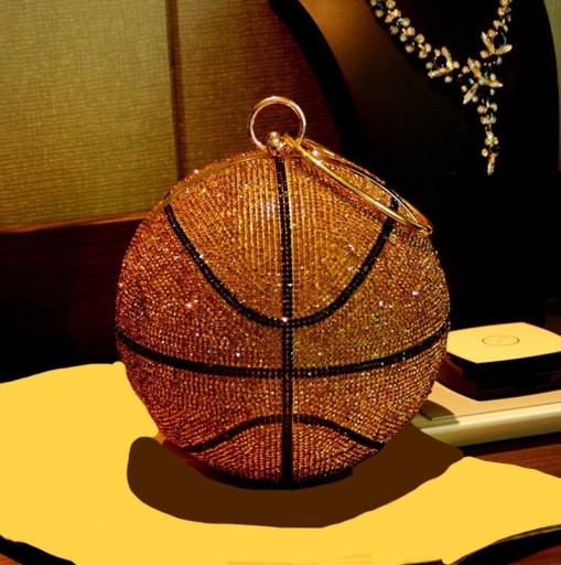 Dámska kabelka v tvare basketbalovej lopty 17 x 17 cm Celoplošne zdobená trblietavými kamienkami Kruhové ucho do ruky Kontrastné pruhy