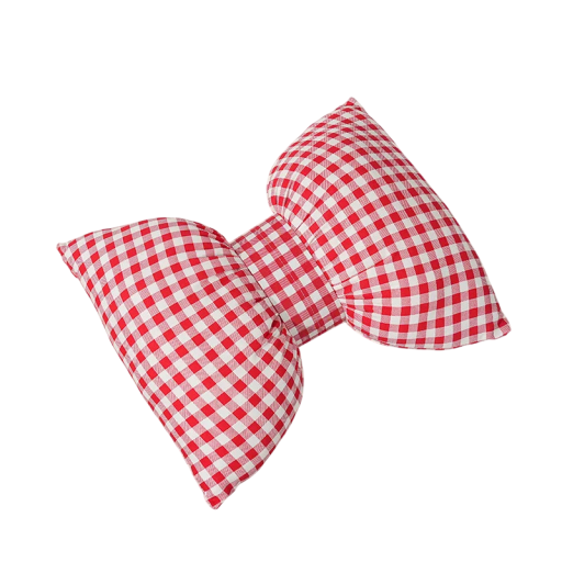 Dekorační polštářek ve tvaru mašle kostkovaný textilní červenobílý vzor designový doplněk na sedačku postel obývací pokoj