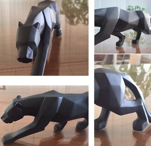 Dekorativ leopardstatue