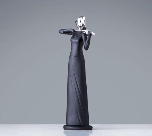Dekorativ statue af en musiker