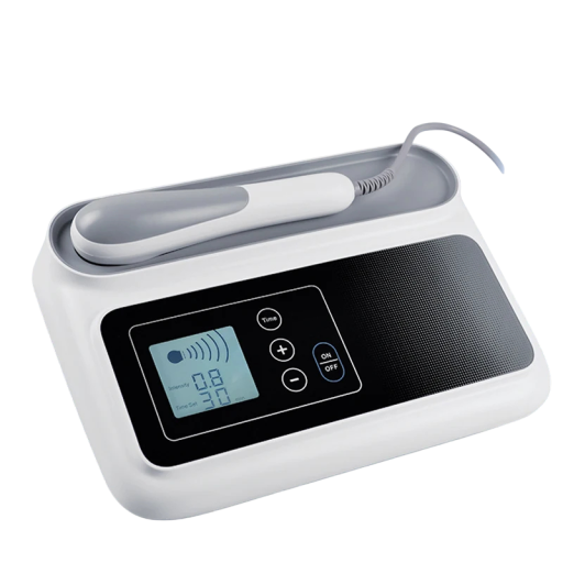 Dispositivo de ultrasonidos para aliviar dolores musculares y articulares con pantalla LCD, control táctil e intensidad de terapia ajustable.
