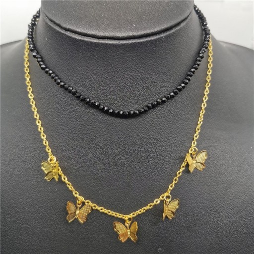 Dubbele damesketting met vlinders en kralen