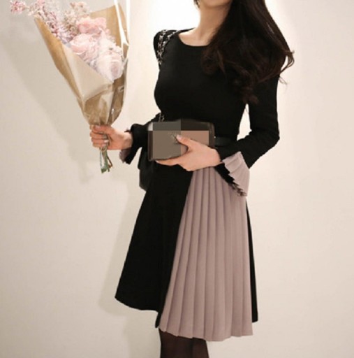 Elegant plisseret kjole