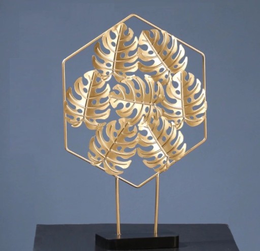 Estatueta decorativa com folhas