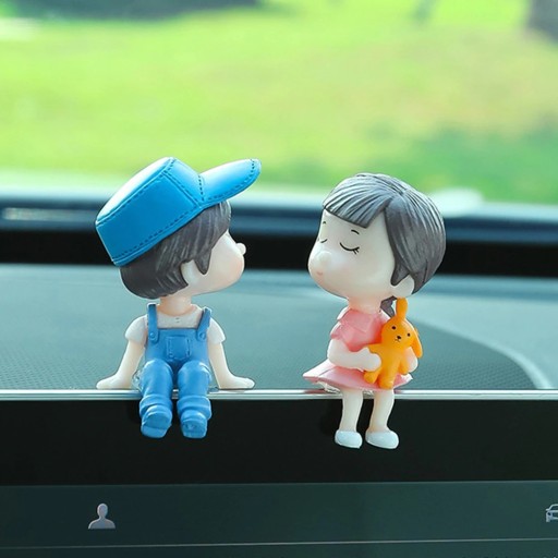 Figurines fille et garçon