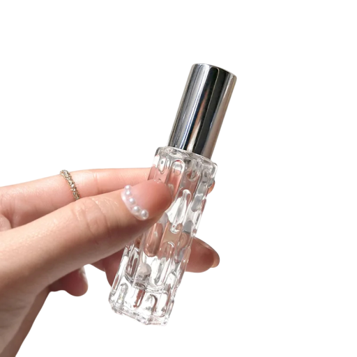 Flacone da viaggio ricaricabile per profumo 10 ml in vetro con superficie decorativa e tappo per il trasporto delle fragranze