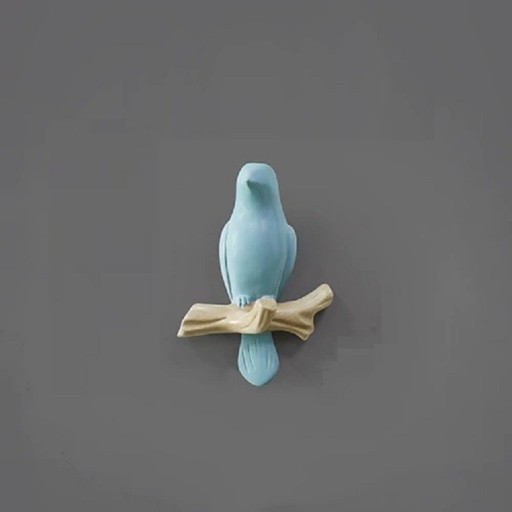 Gancho decorativo en forma de pájaro.