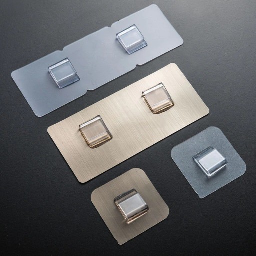 Gancio adesivo in plastica