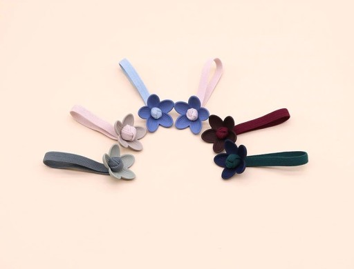 Gommette à cheveux avec fleur A101
