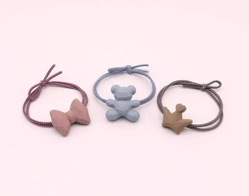 Gumiça para o cabelo com decoração