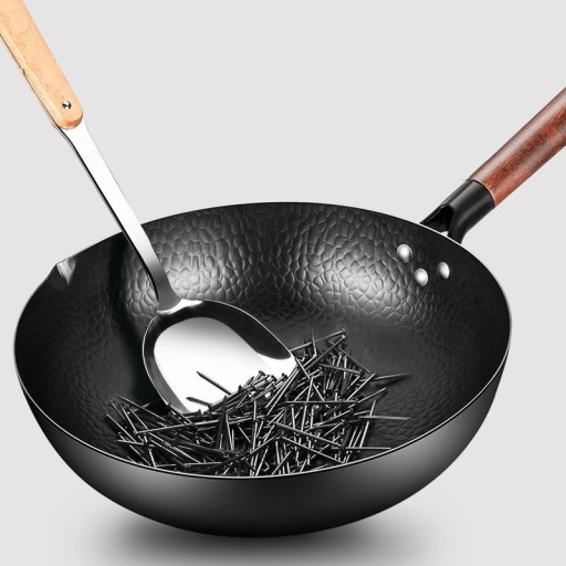 Jernpande med trælåg